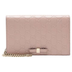 Gucci Guccissima Leather Signature Bow Mini Wallet on Chain