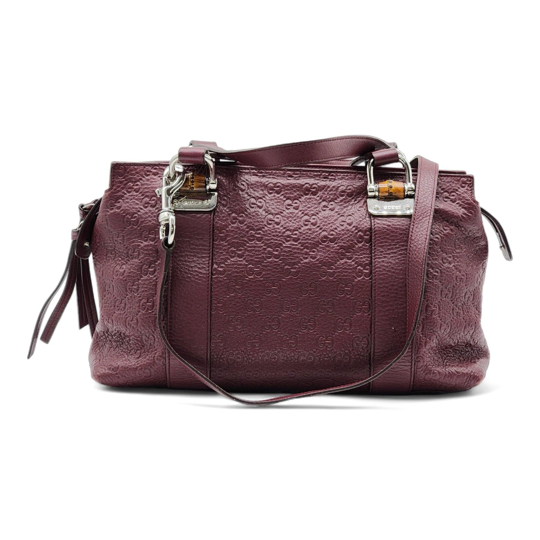 Gucci Guccissima Medium Bamboo Bar Shoulder Bag in Burgundy.

GG Embossed leather in burgundy, Silver hardware, Detachable shoulder strap, Interior lining with pockets.

Additional information:
Material: Leather
Style: 355772
Color: