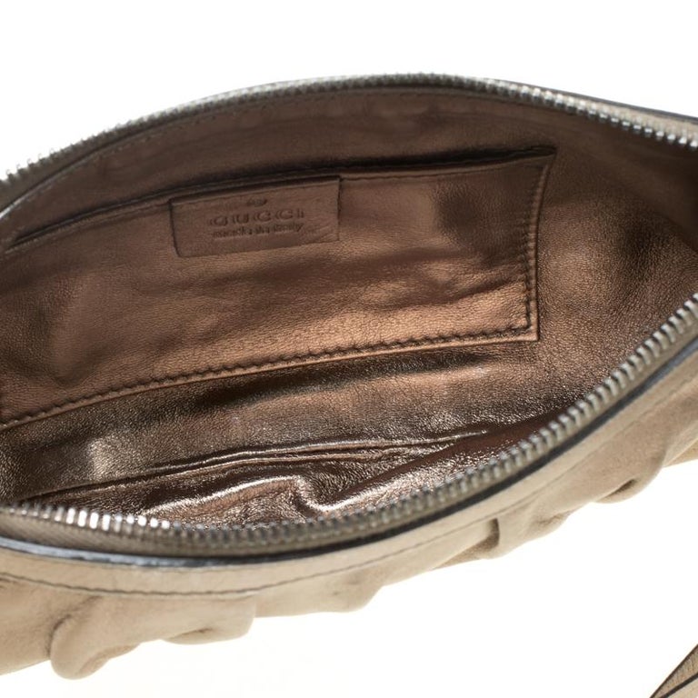 gucci clutch with tassel