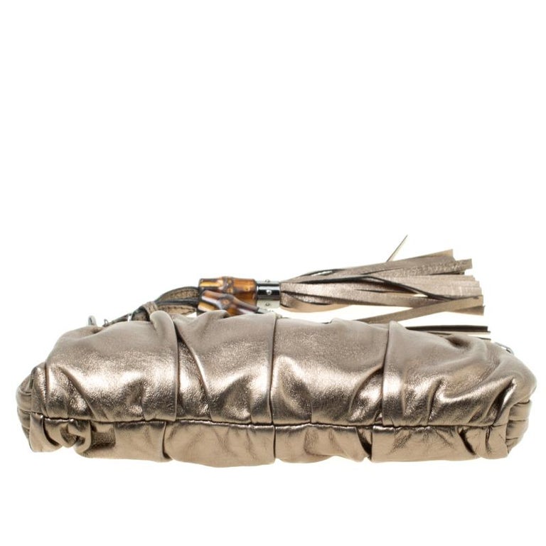gucci clutch with tassel