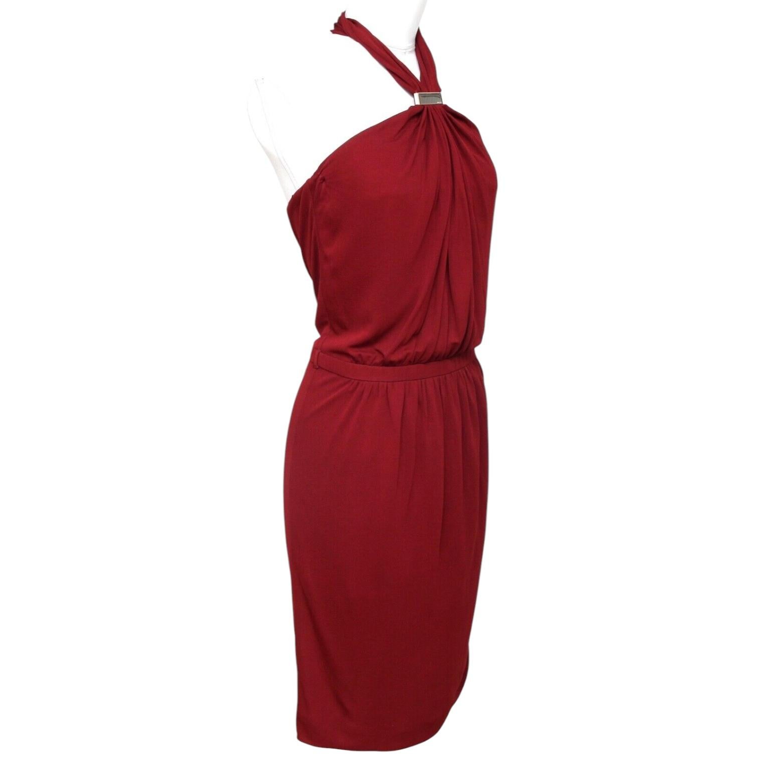 GUARANTEED AUTHENTIC GUCCI MAROON HALTER DRESS


Design:
- Beautiful maroon (brownish red) halter style dress in a rich viscose material.
- Gold-tone signature plaque at neckline.
- Rouching throughout.
- Double snap at neckline and rear zipper