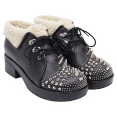 Gucci Harlem Spike Stiefeletten mit Shear-Futter aus schwarzem Leder