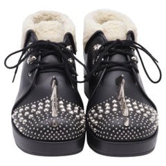 Gucci Harlem Spike Stiefeletten mit Shear-Futter aus schwarzem Leder