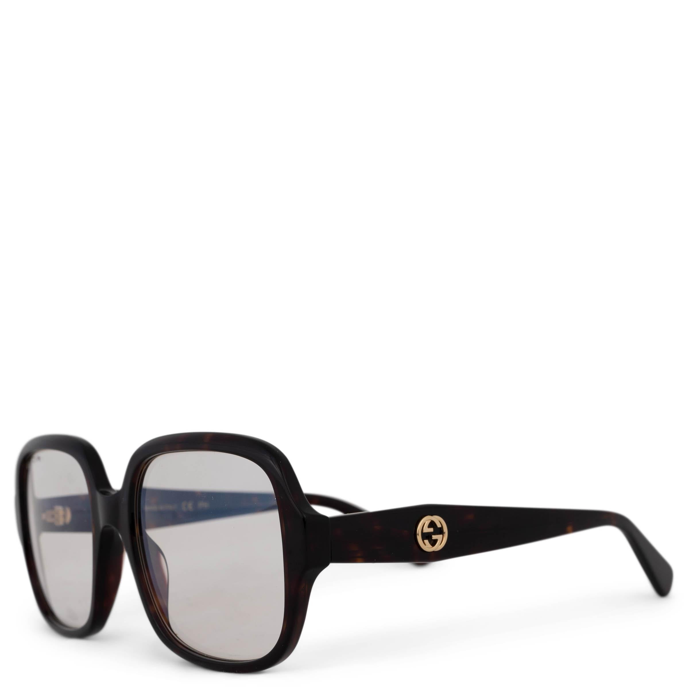 Diese 100% authentische quadratische Sonnenbrille von Gucci aus schildpattbraunem Havanna-Acetat strahlt mühelose Raffinesse aus. Sie ist mit phototropen Gläsern und Blaulichtgläsern für optimalen Sichtschutz ausgestattet und wird durch goldfarbene
