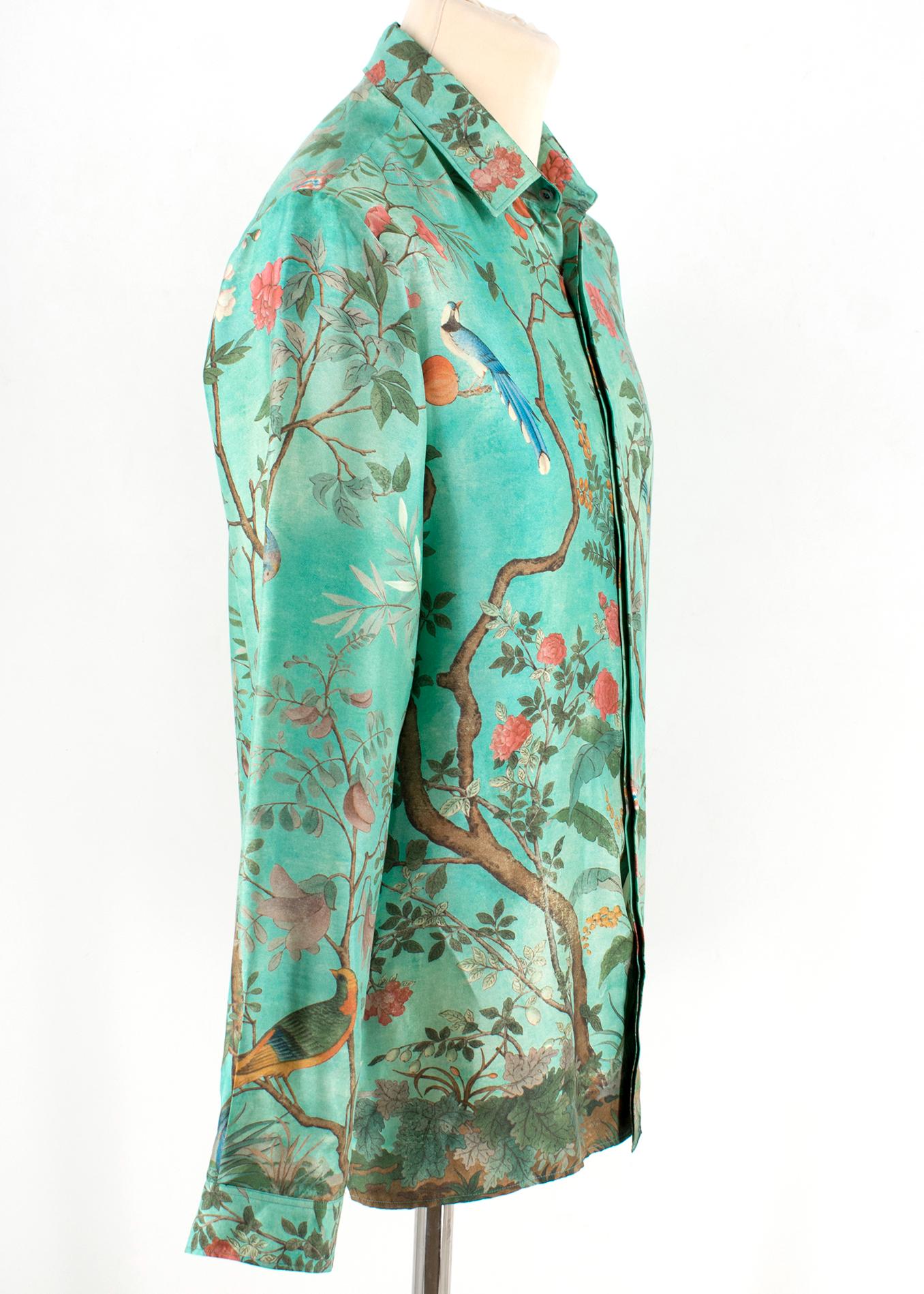 Gucci Heritage Floral Print Silk Shirt

Floral print green silk shirt
Self-covered buttons
Long sleeves
Oversize fit
Button up shirt
Silver hidden buttons
Light weight material 
Button up cuffs

Please note, these items are pre-owned and may show