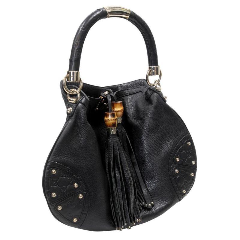 Gucci Hobo Top Handle Large Leather Babouska Indy GG Shoulder Bag GG-0407N-0116

We can always count on Gucci for styles that we love now and later. This gorgeous Gucci Black Leather Large Babouska Indy Top Handle Bag features a chic hobo design
