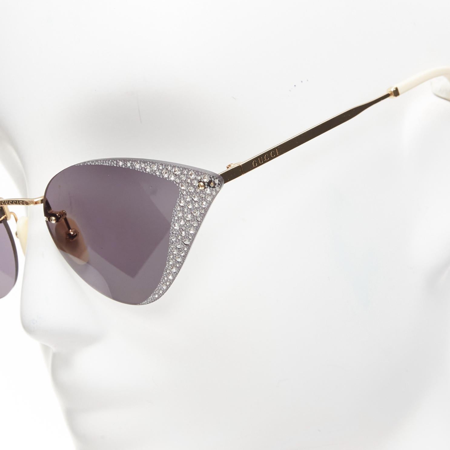 GUCCI Hollywood Forever GG0898S silver crystal black cat eye sunglasses
Reference: TGAS/D01030
Brand: Gucci
Designer: Alessandro Michele
Model: GG0898S
Collection: Hollywood Forever
Material: Metal
Color: Gold, Black
Pattern: Crystals
Lining: Gold