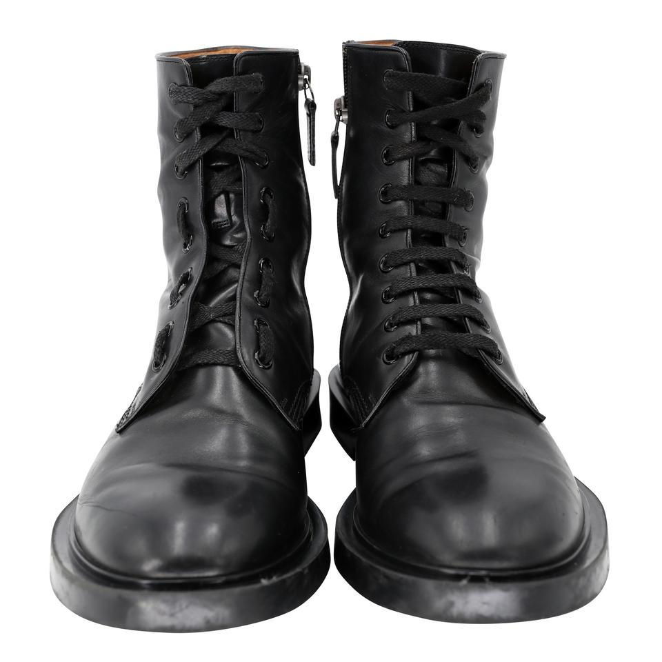 Gucci Homme Navigate GG 9 Leather Hi Laced Combat Boots GG-S0225P-0004

These men's GUCCI Homme Navigate Noir Leather high shaft Combat boots are precisely what every fashionista is looking for! These boots have a thick lace-up combat boot style GG