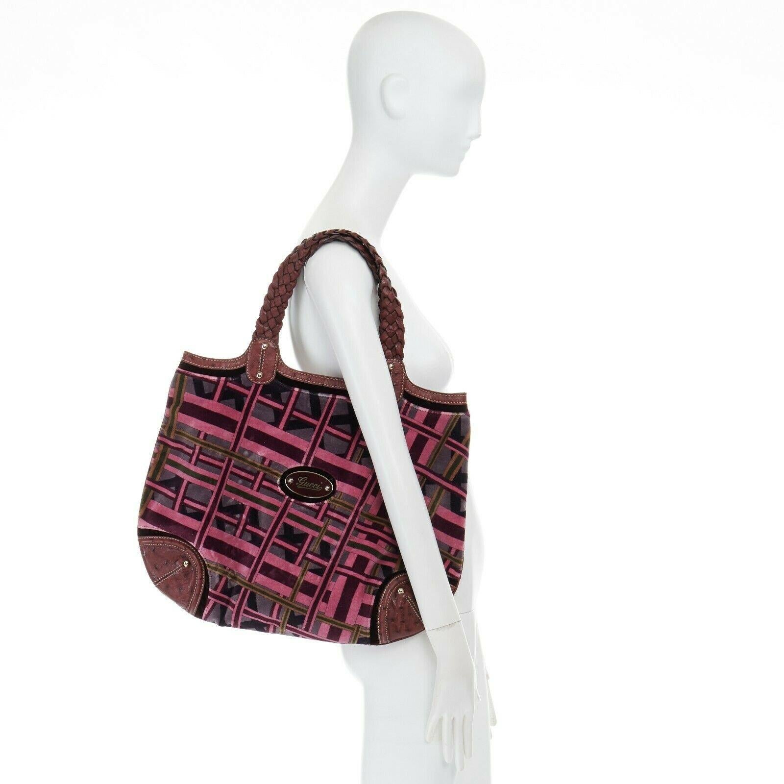 GUCCI Hong Kong exclusive purple geometric velvet ostrich trimmed hobo bag Reference: KMTG/A00021 
Brand: Gucci 
Model: Jackie 
Collection: 2006 
Material: Fabric 
Color: Purple 
Pattern: Geometric 
Closure: Button 
Extra Detail: Purple and pink