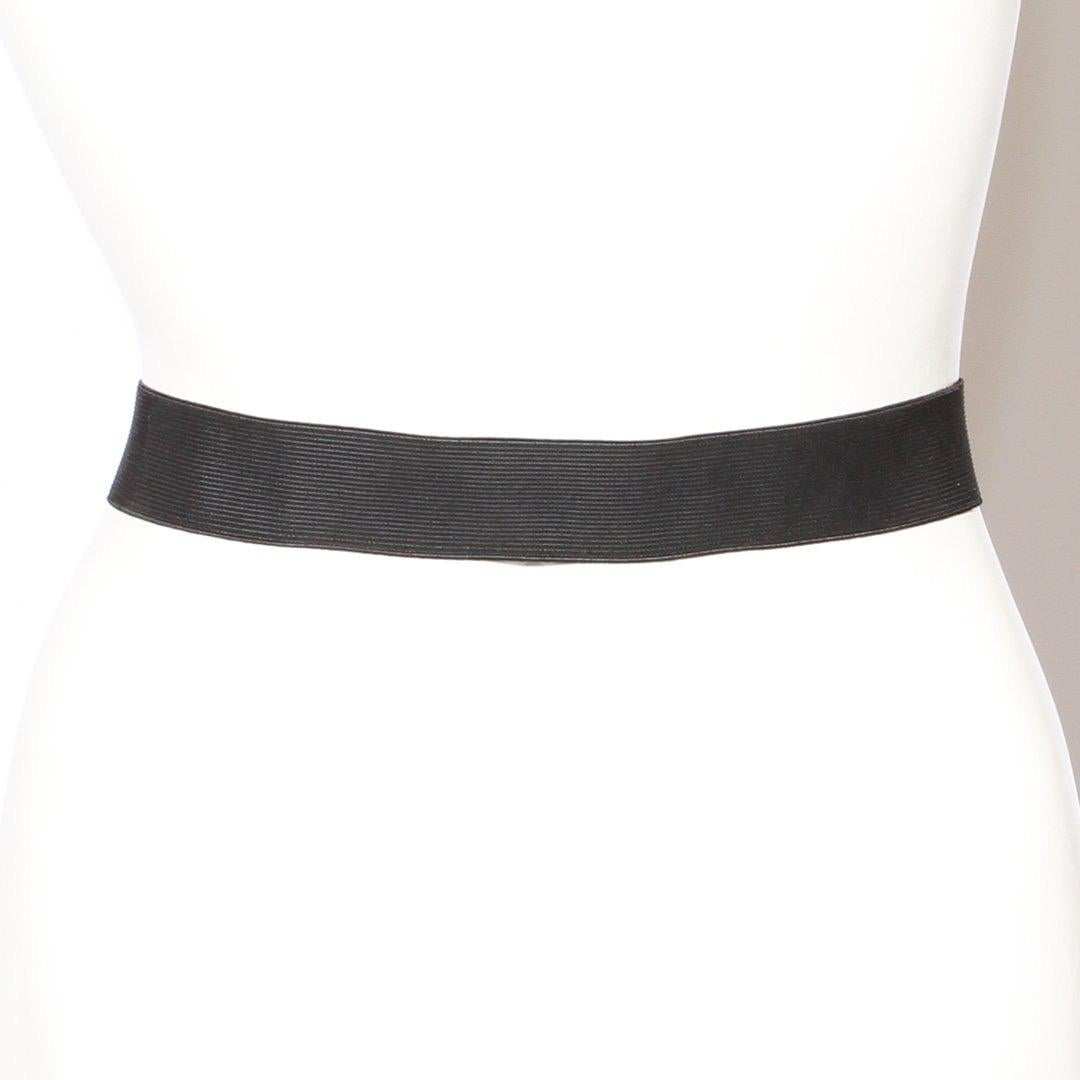 Horse-bit Buckle Elastic Waist Belt by Tom Ford for Gucci
1990s-2000s
Button stud secured leather trim
Elastic belt
Silver-tone iconic horse-bit hardware 
Made in Italy
Condition: Very good condition, consistent with use and age. Some light surface