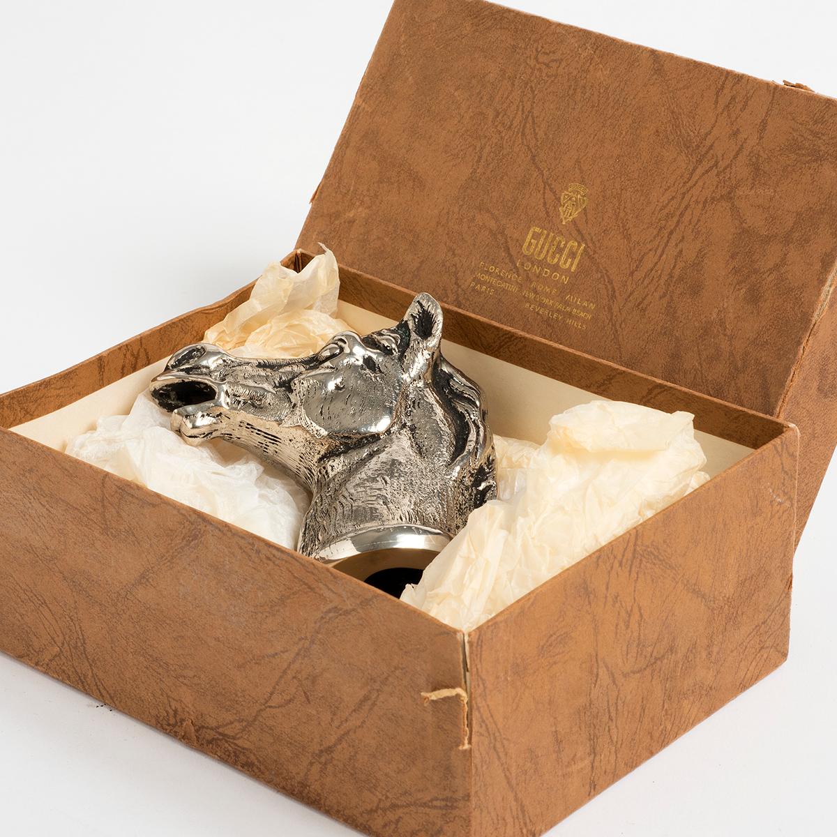 Our vintage Gucci horse head bottle opener in silver plate is signed Gucci Made in Italy and measures 8cm x 8cm. Of all the accessories released by Gucci in the 1970s, the horse head is perhaps the most true to the Gucci design themes, horse-bit