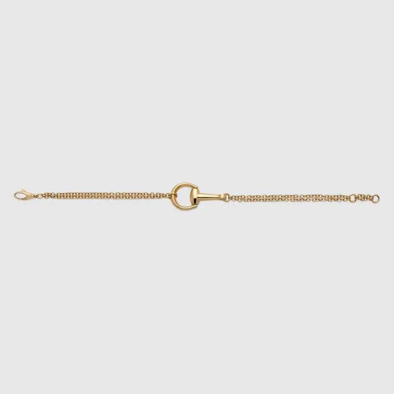 Gucci celebrates the 20th anniversary of the signature Horsebit jewelry line with classic and iconic pieces in 18k yellow gold. This chain bracelet is defined by a half-horsebit variation of the signature detail.

Horsebit motif
Clasp