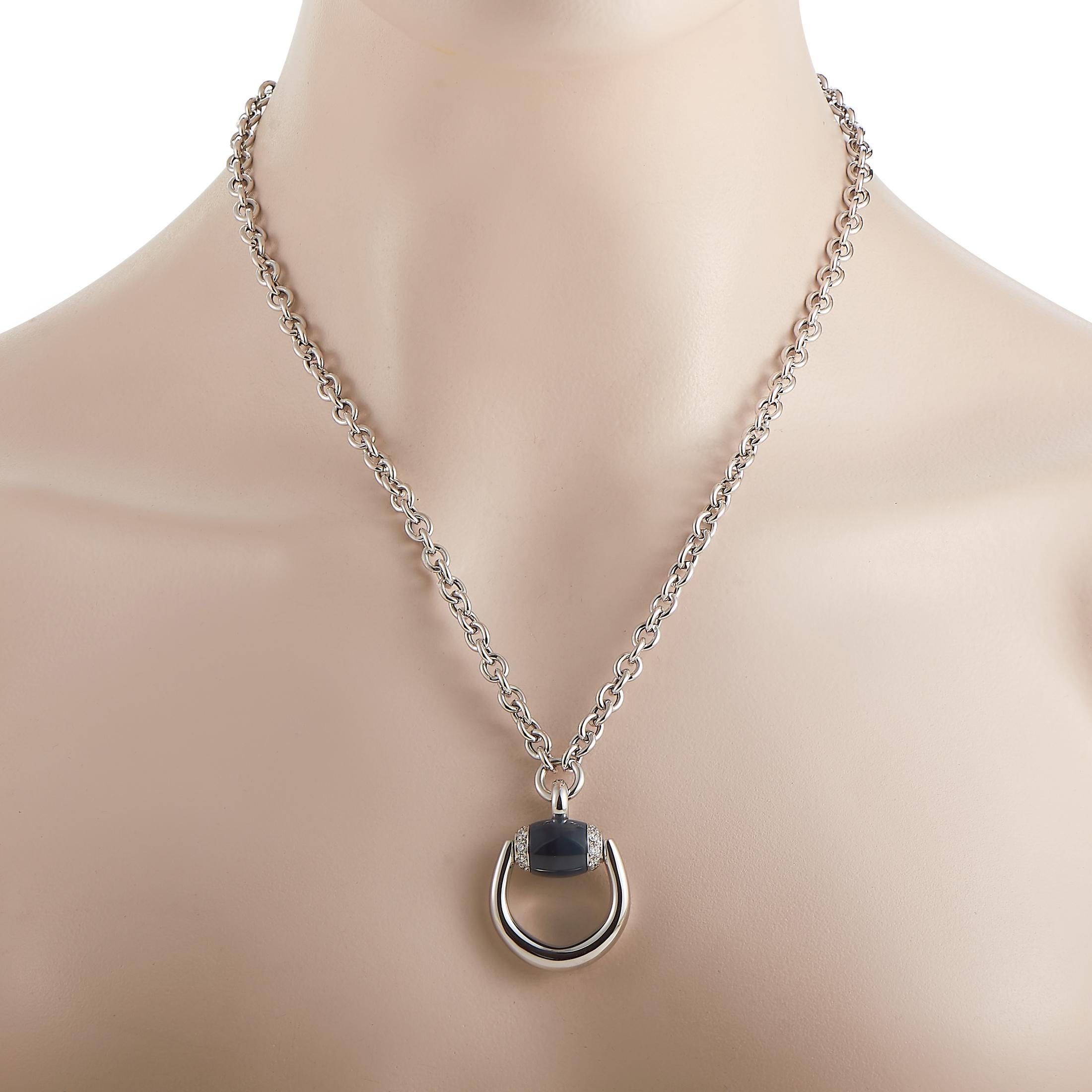 Sleek and elegant, this iconic Gucci Horsebit necklace is an understated piece that will never go out of style. An 18K White Gold pendant measuring 1.5” long and 1.15” wide makes a statement thanks to a glossy black onyx gemstone, which is also