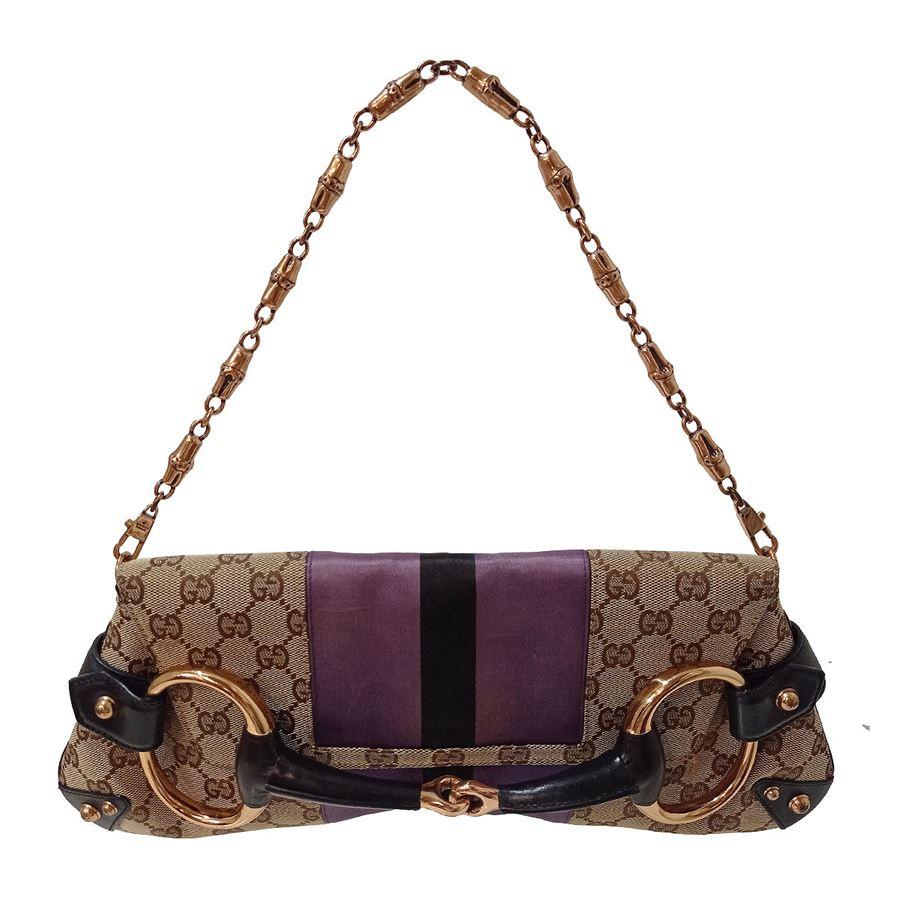 Iconic Gucci bag
Leather and textile
GG Logo
Lilac in the centre
Metal and leather
Metal chain
Authomatic button closure
Internal pocket
Cm 37 x 15 ( 14,56 x 5,9 inches)
Light signs on lilac as in picture
Worldwide express shipping included in the