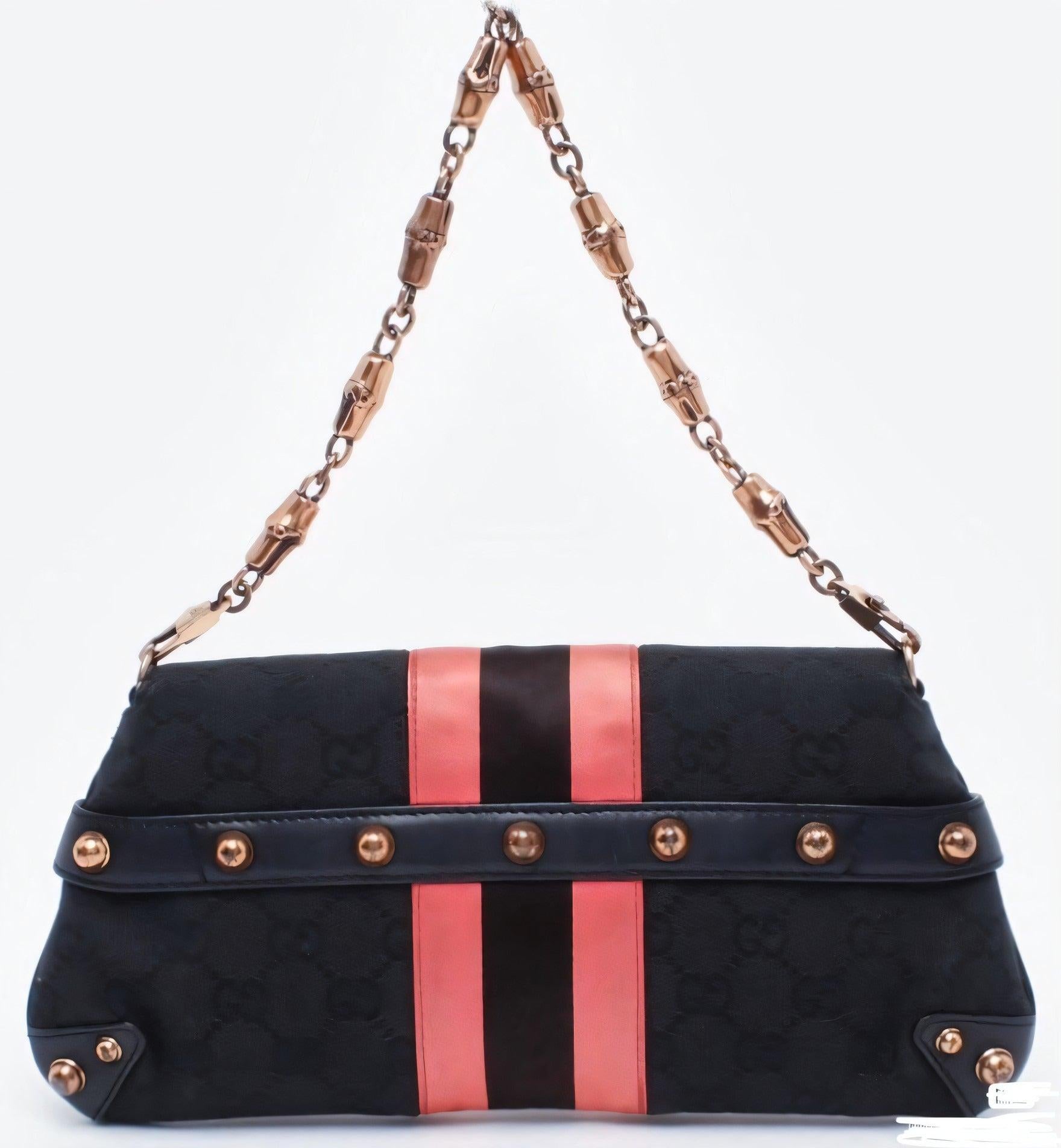 Gucci Horsebit 1955 Chain Shoulder bag Black monogram with Pink silk stripe
 These are professional photos of the actual bag offered by Luxbags.
 Make a statement with this Small Gucci Horsebit 1955 Chain shoulderbag. Crafted from iconic Gucci