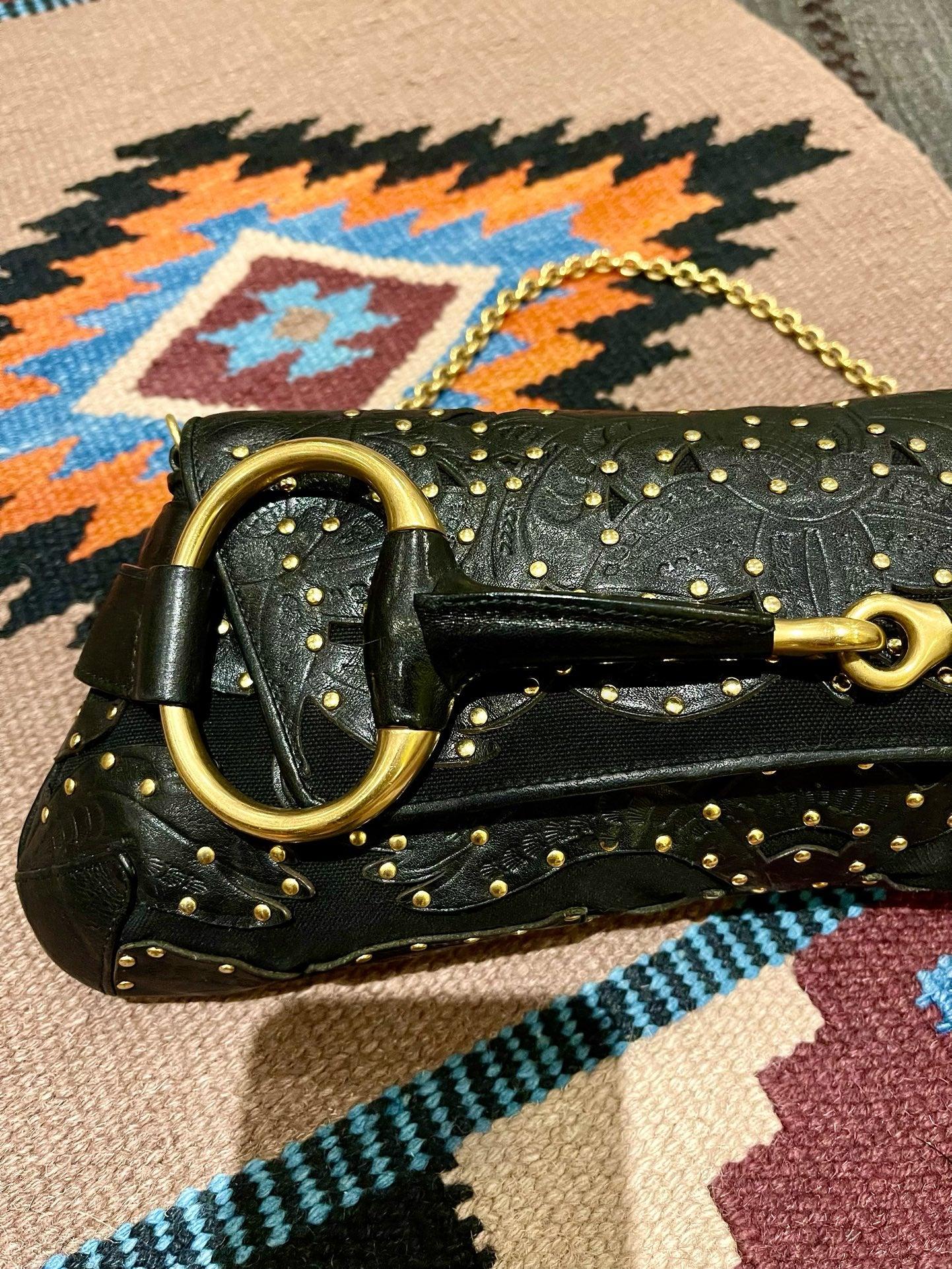 Gucci Horsebit 1955 Chain Shoulder bag Large Black Embossed Leather and Gold Studs
 These are professional photos of the actual bag offered by Luxbags.
 Make a statement with this large all black leather Gucci shoulder bag. Crafted from scratch