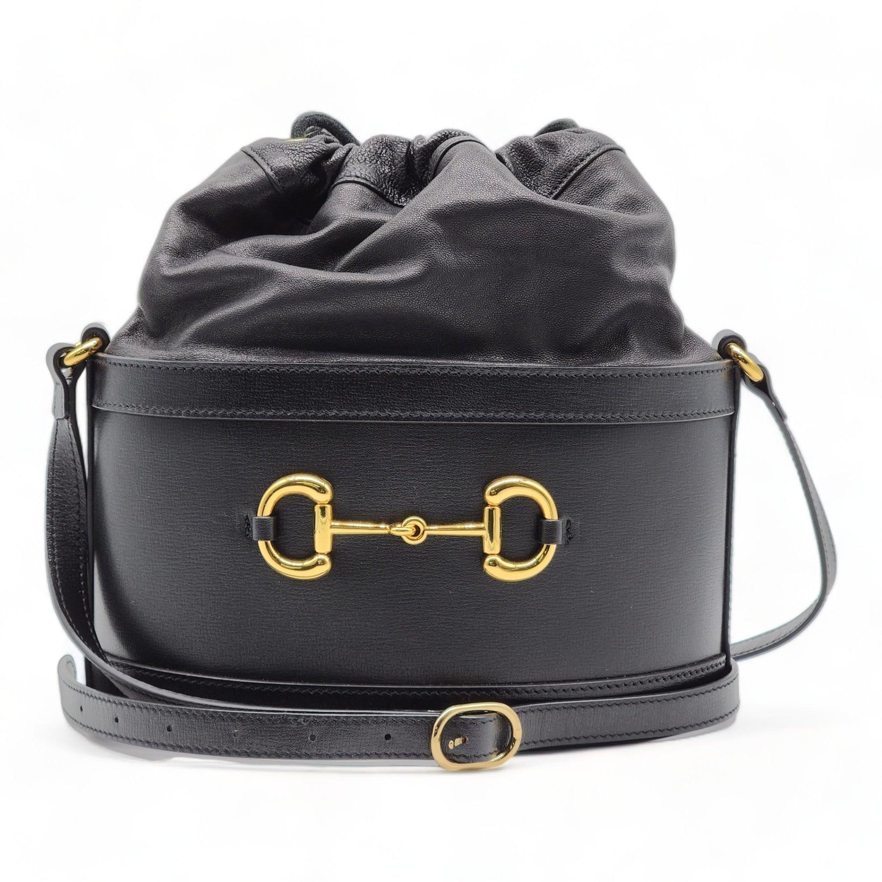 Gucci Horsebit 1955 Leather Bucket Bag.

Additional information:
Material: Black leather
Drawstring closure
Microfiber suede-like lining with interior pocket
Color: Black
Size: 9