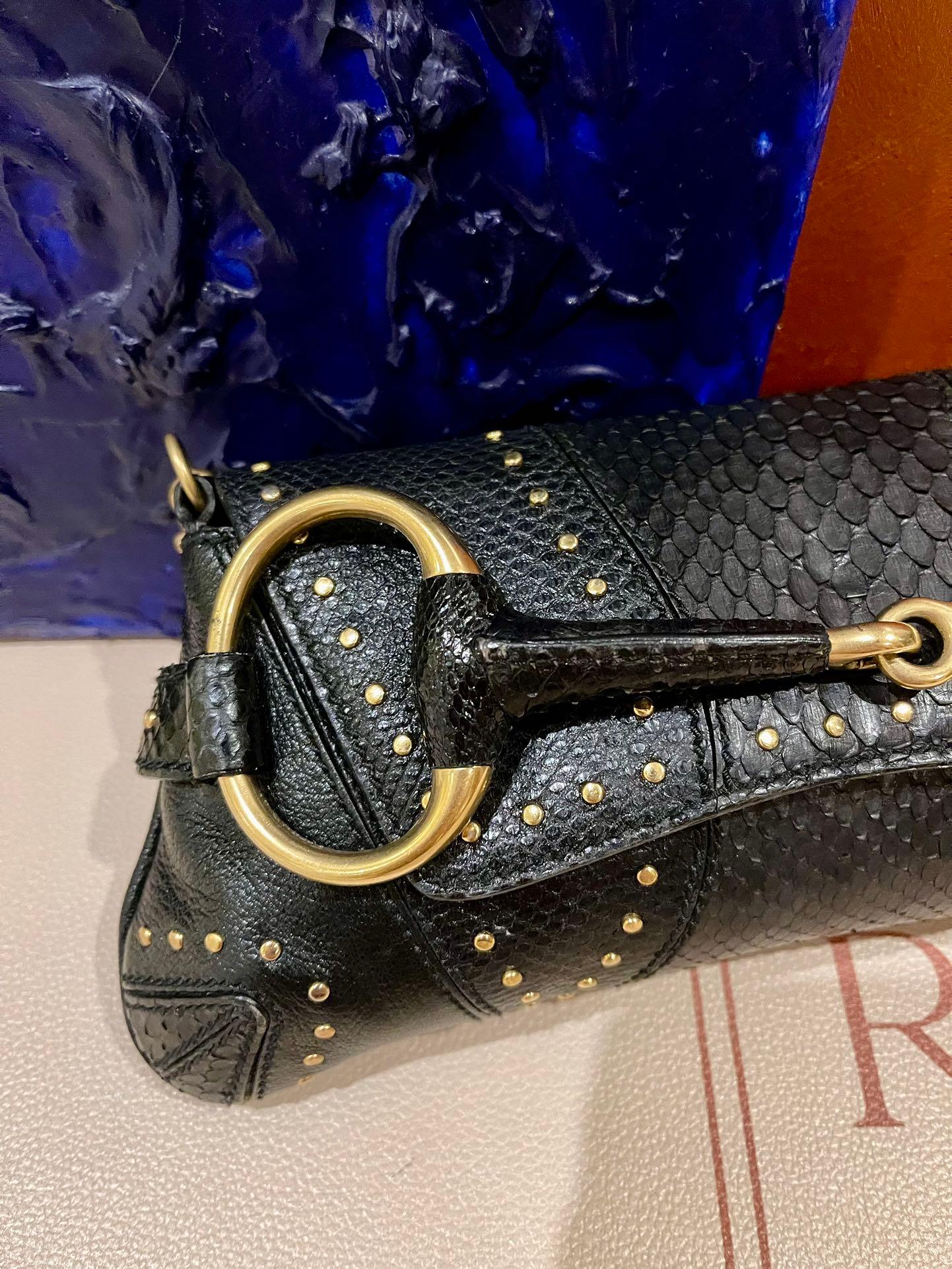 Gucci Horsebit 1955 Small Snake skin leather Black Gold Studded Shoulder Bag
These are professional photos of the actual bag.


Make a statement with this large Gucci shoulderbag. This model is revived in the Gucci 2023 Fall/Winter collection. Grab