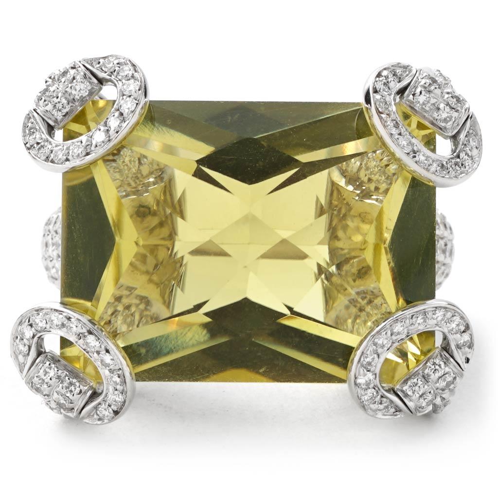 Previously owned and retired Gucci Horsebit Collection ring. The ring is a size 6 (US), made of 18K white gold, and weighs 13.90 DWT (approx. 21.62 grams). It also has one checkerboard lemon quartz, and 250 round G-color, VS-clarity diamonds
