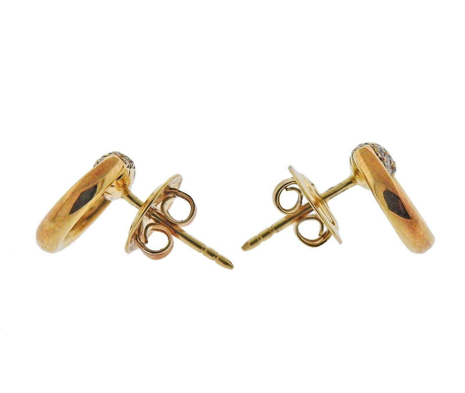 New 18k yellow gold pair of Horsebit stud earrings by Gucci, with approx. 0.30ctw in G/VS diamonds. Retail $1700, come with box/papers. Earrings are 10.5mm x 10mm, weight - 4.1 grams. Marked: Gucci, 750, Italy.