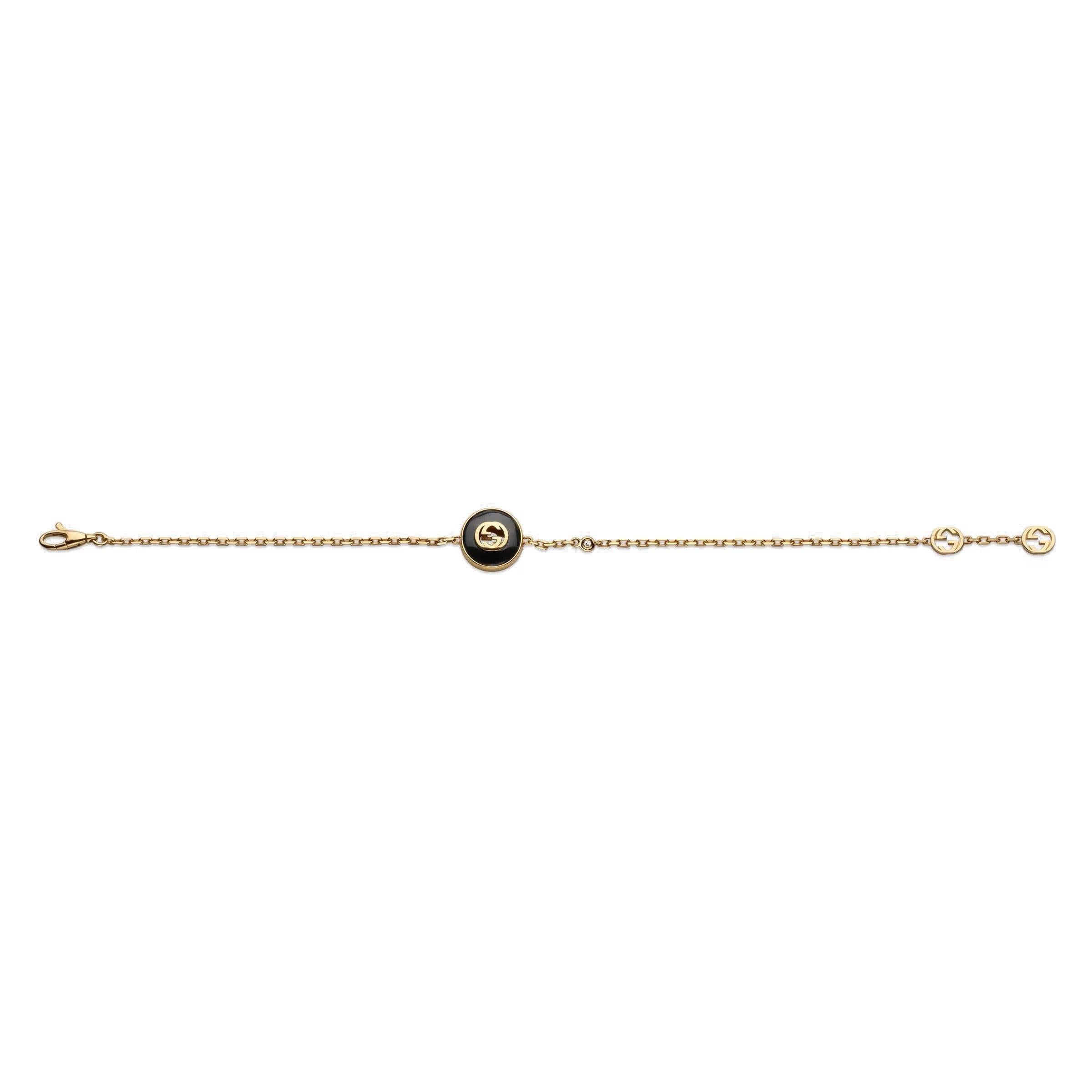 The Interlocking G logo appears in elegant new interpretations for Pre-Fall 2024. Precious black onyx stone is paired with yellow 18k gold and embellished with sparkling diamonds. This chain bracelet can be matched with other accessories from the