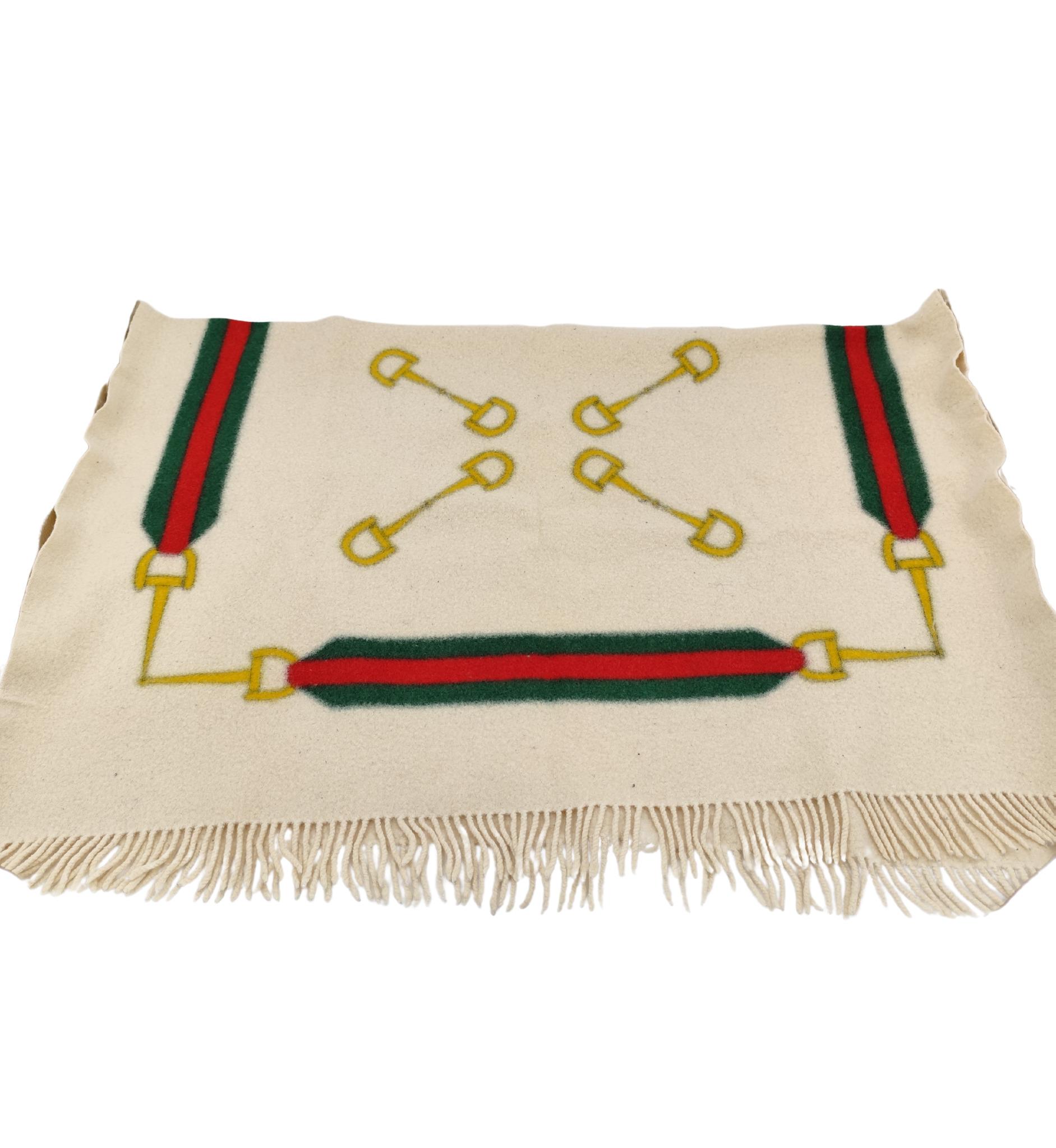 Gucci throw blanket
Cream color with red green stripes and horsebits
Wool blend 

Measurements:
90x120 cm 35.5x47 in

Good condition
Some stiffness and color bleeding