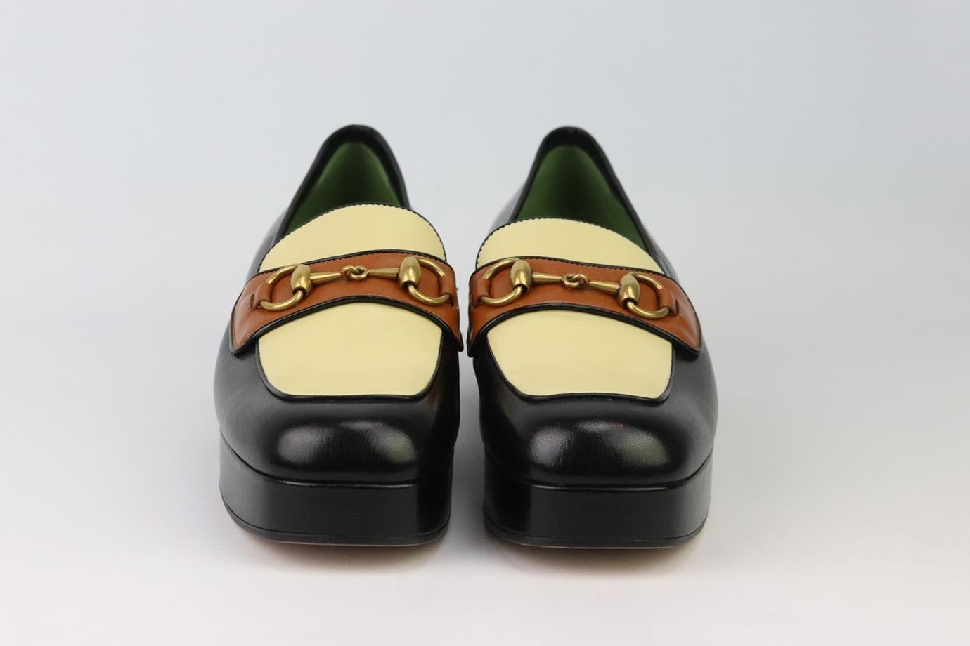 These 'Houdan' court shoes by Gucci have been made in Italy from brown, black and cream leather and set on chunky platform heels and are finished with the brand’s iconic horsebit-detail on the top. Heel measures approximately 44 mm/ 1.75 inch.
