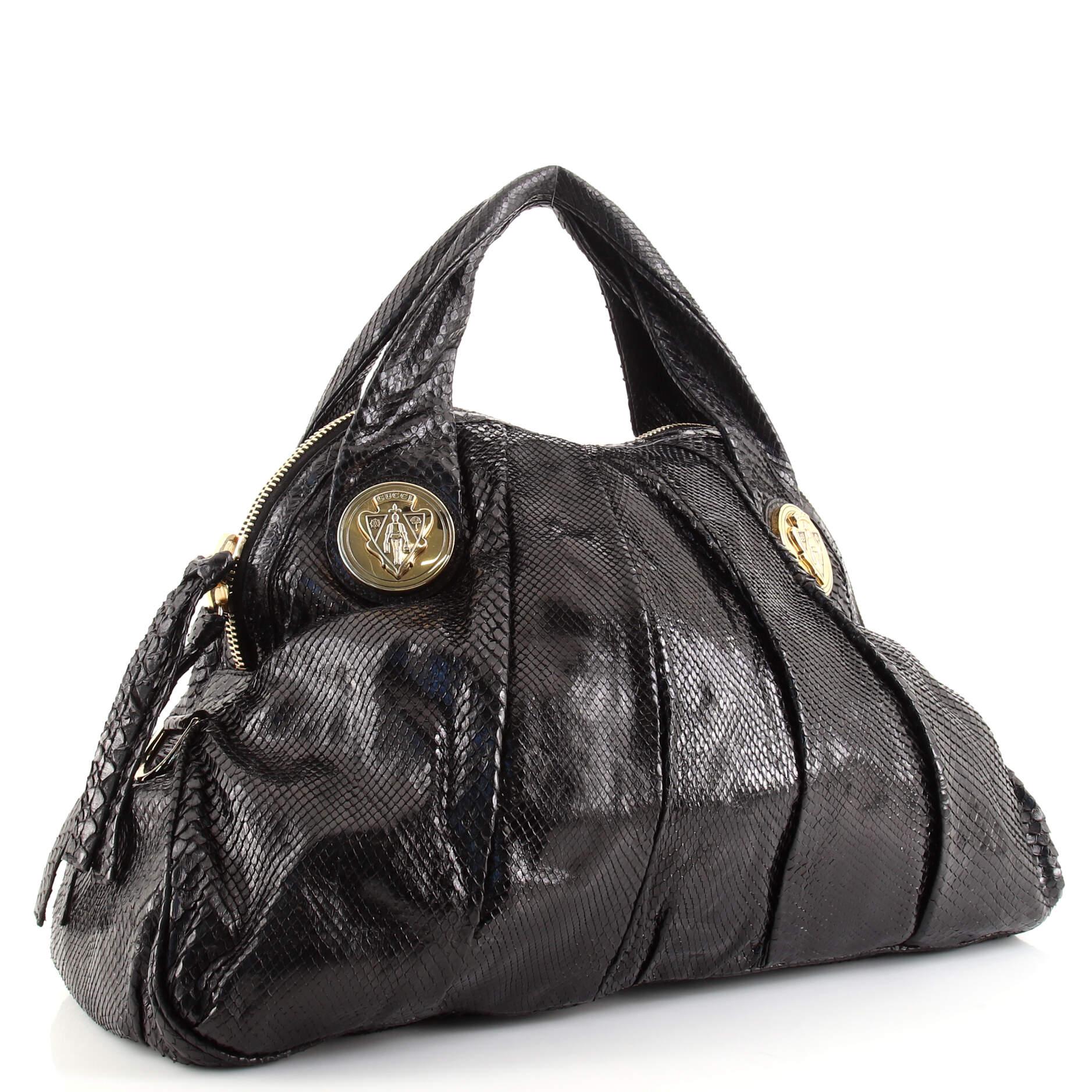This item can only be shipped within the United States.

Condition: Good. Odor in interior. Wear, marks and peeling on exterior and handles, heavy wear and stains in interior, scratches on hardware.
Accessories: No Accessories
Measurements: Handle