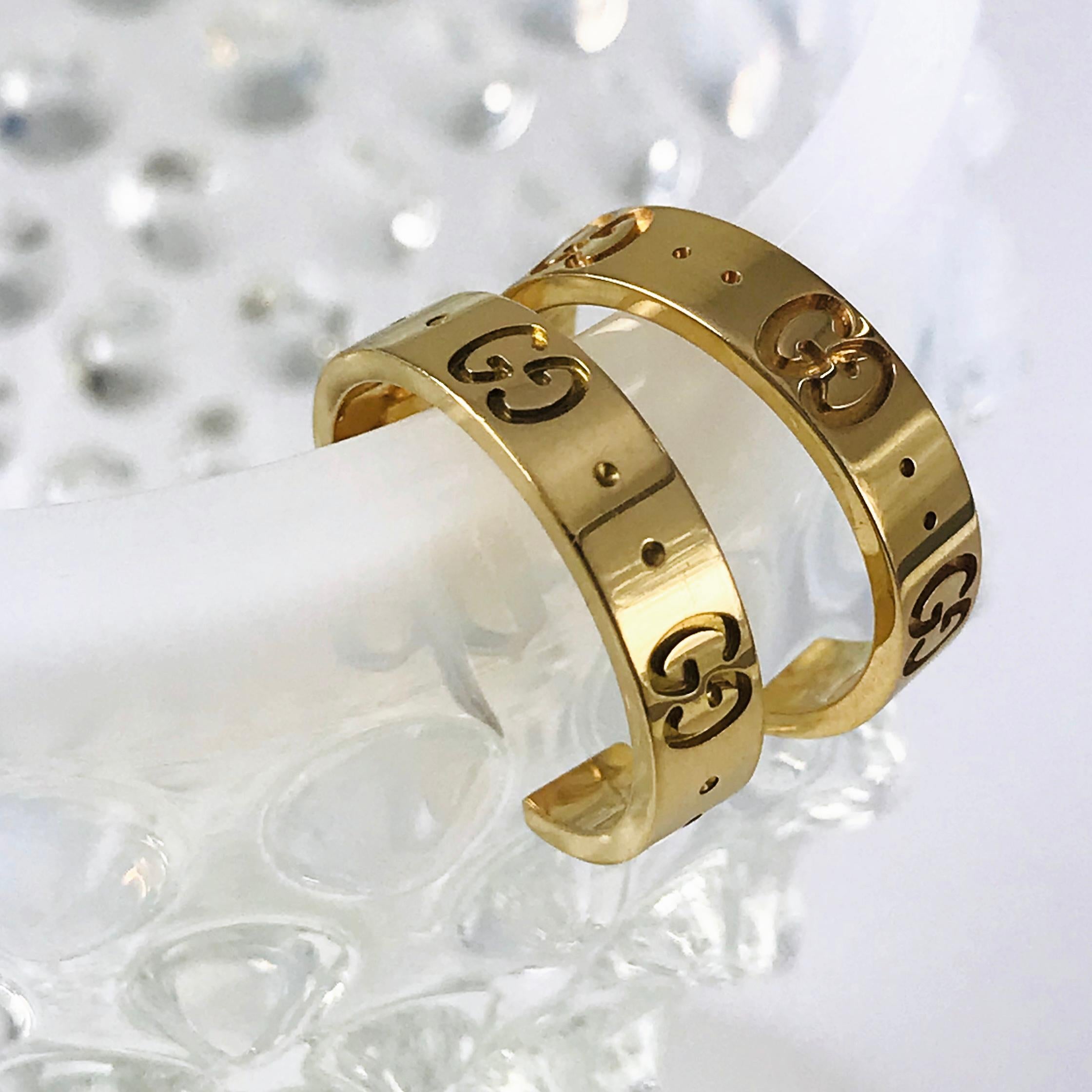 Gucci Icon 18k White Gold Small Hoops Earrings. The famous Gucci “GG” Icon is embossed on each earring hoop. Hallmark Gucci, Made in Italy 750 on the inside of hoop. 
