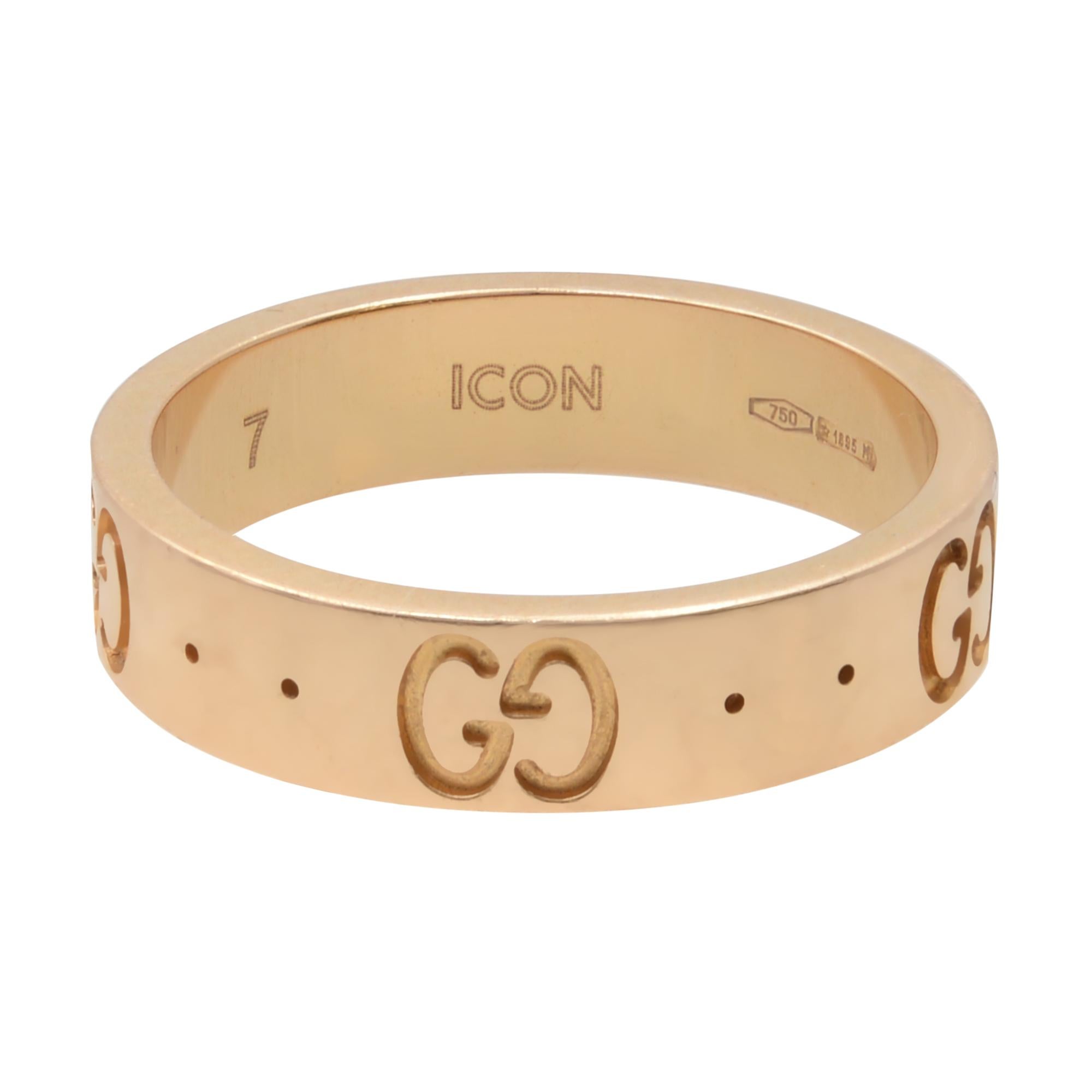 This Gucci Icon ring is crafted from 18k rose gold with engraved Gucci GG logo. Ring size 4. Width: 4mm. Look cool as a pinky ring. Great pre-owned condition. Comes with a Gucci box. 
