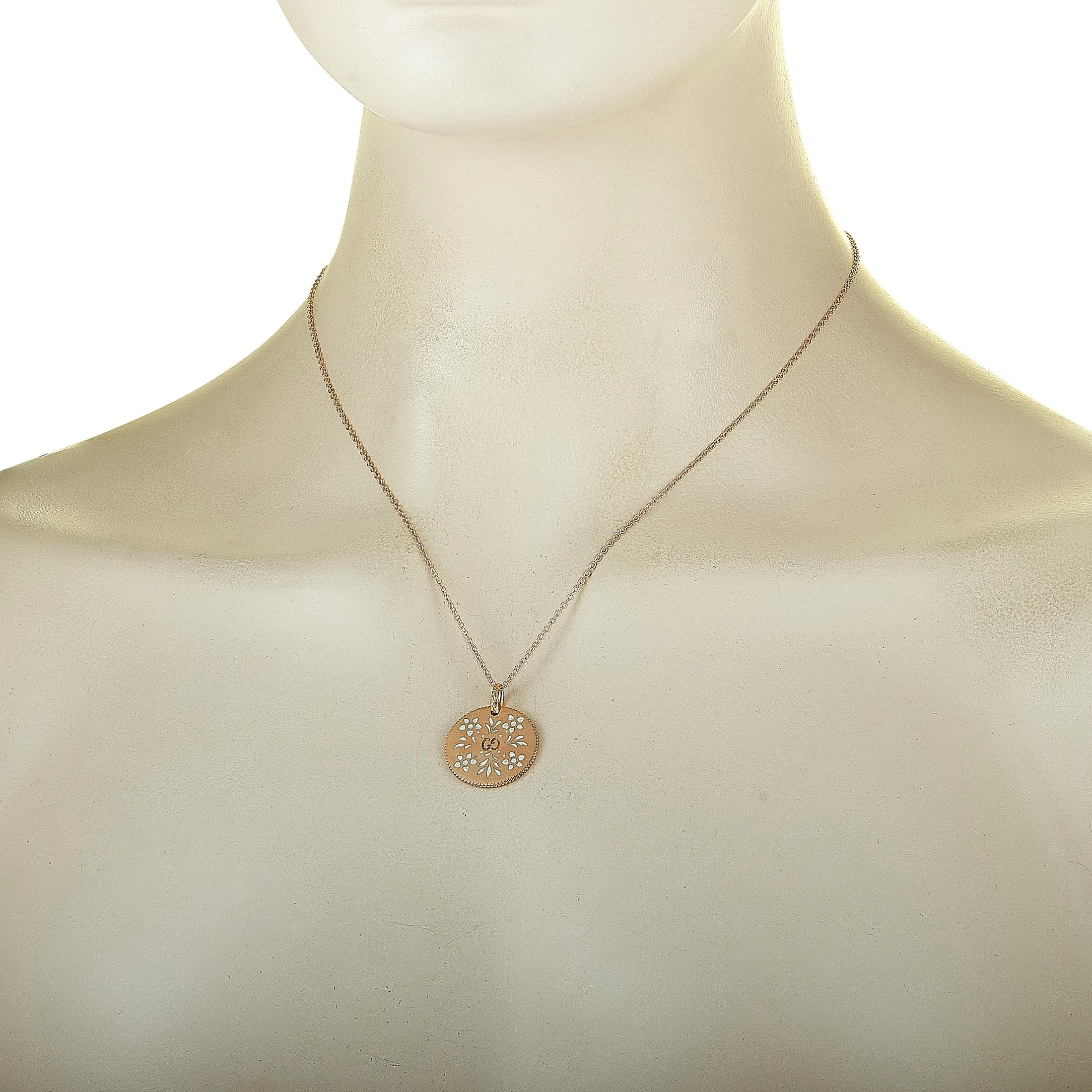 The Gucci “Icon Blooms” necklace is made out of 18K rose gold and white enamel and weighs 7 grams. The necklace boasts an 18” chain and a pendant that measures 1” in length and 0.80” in width.
 
 This jewelry piece is offered in brand new condition