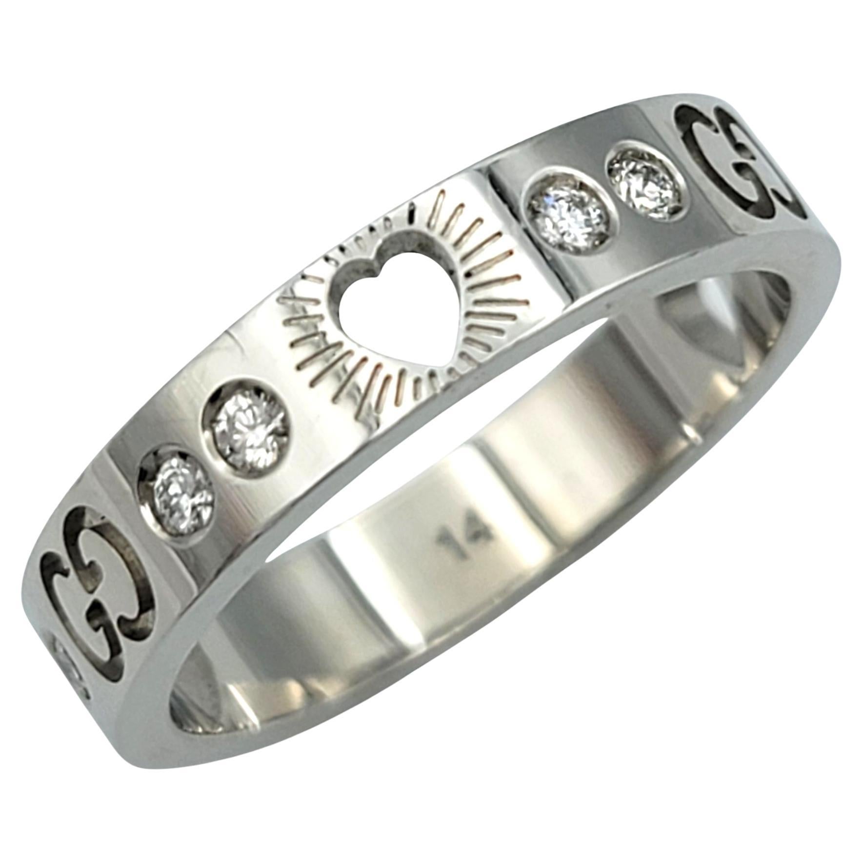 Ring Size: 6.75

Embrace the perfect fusion of iconic design and contemporary elegance with this stunning Gucci ring. Crafted in luxurious 18 karat white gold, the band features intricate heart cut-outs, a subtle yet powerful symbol of love and