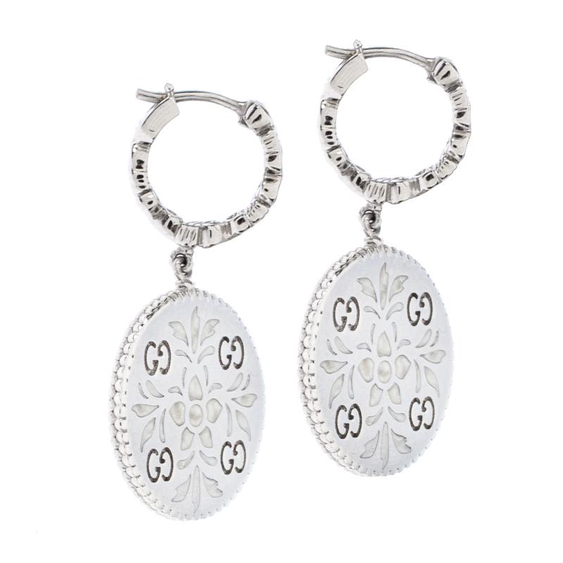 It is every woman's dream to have a set of earrings as beautiful as this one from Gucci. The earrings are made of 18k white gold with droplets of circles each engraved with flowers. A creation as lovely as this set of earrings definitely deserves to