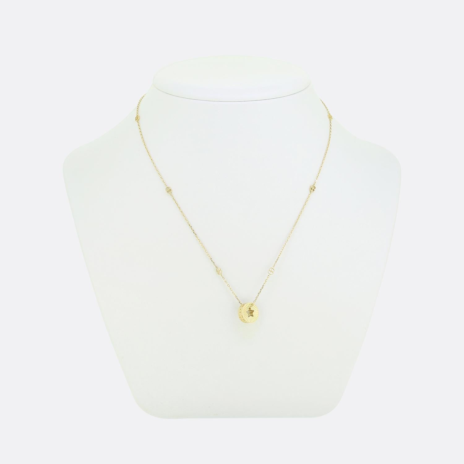 Here we have a highly detailed necklace from the world renowned Italian fashion house of Gucci. Crafted from a warm 18ct yellow gold, this necklace features a circular pendant with a open sunburst star design amidst a concave imprint and light