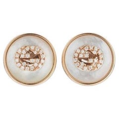Gucci Pendientes de nácar con diamantes entrelazados YBD786746001