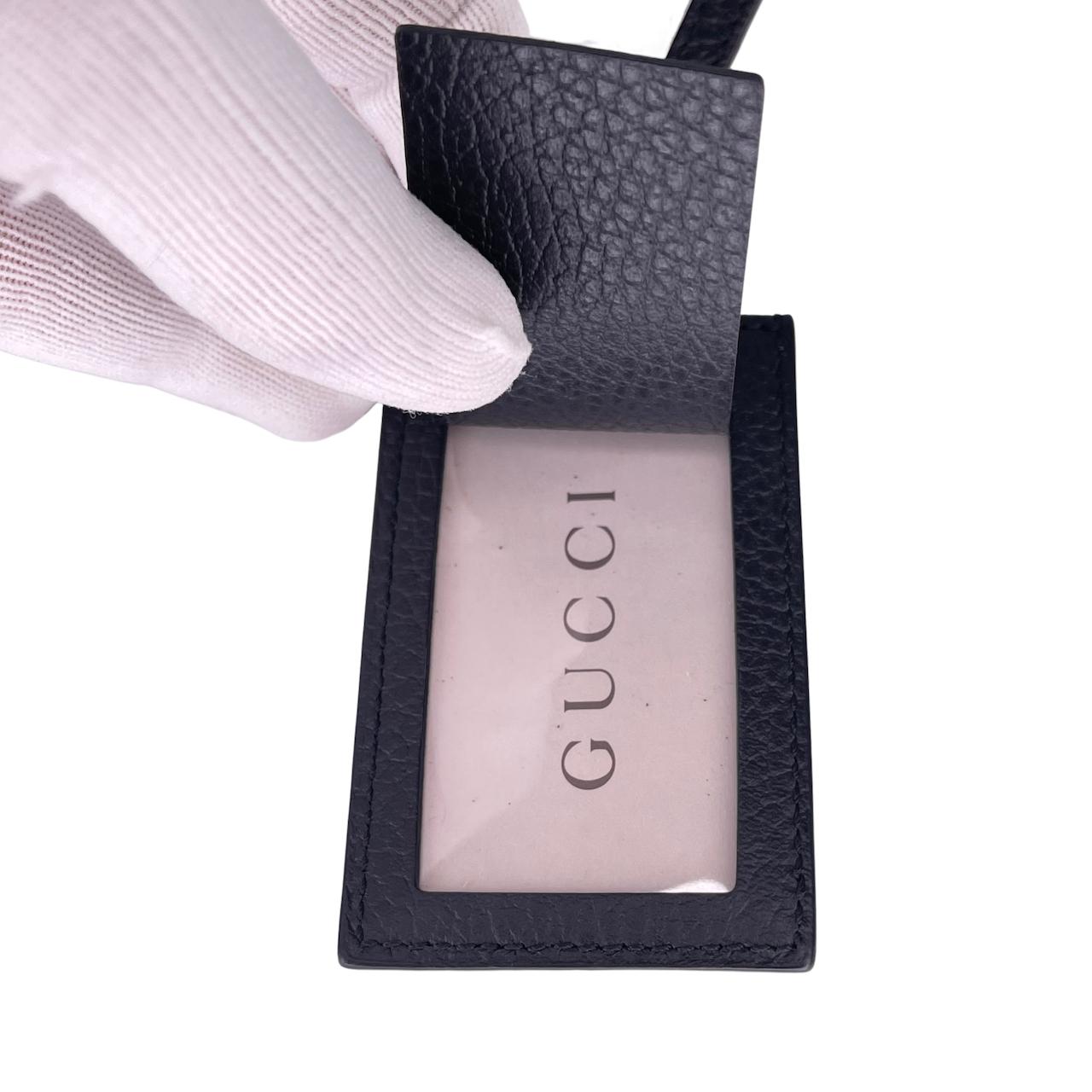 Gucci Ineinandergreifendes G-Leder-Gepäckanhänger, Schwarz im Zustand „Hervorragend“ in Montreal, Quebec