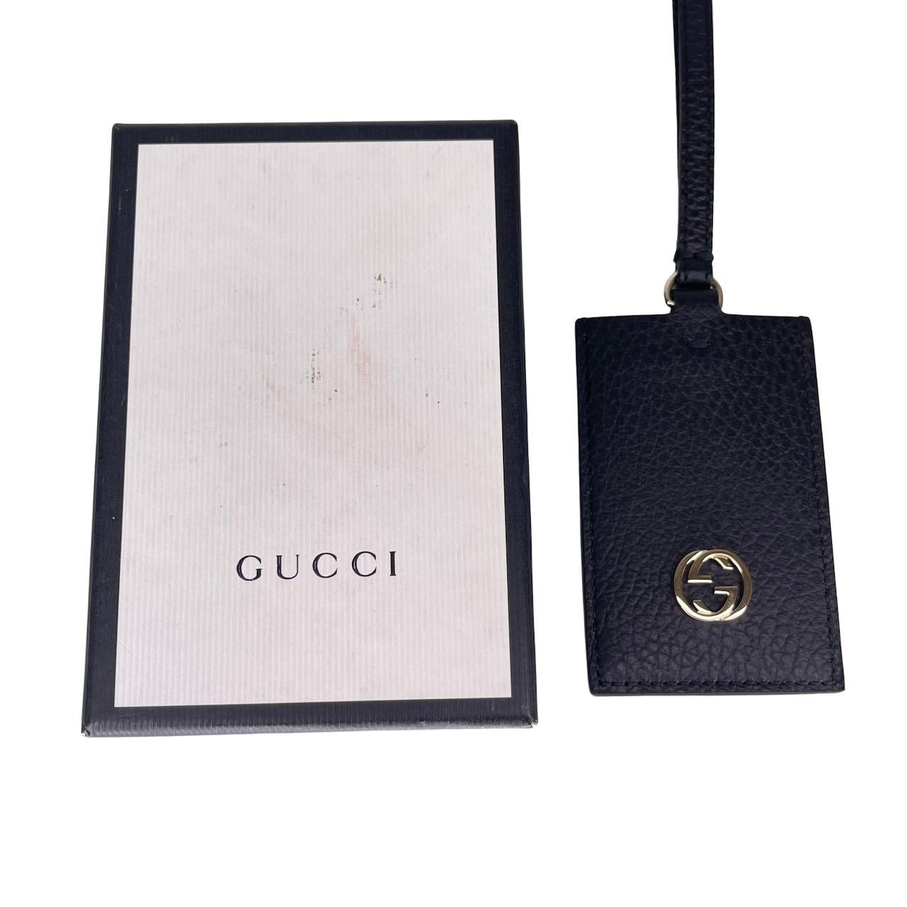 luggage tag gucci