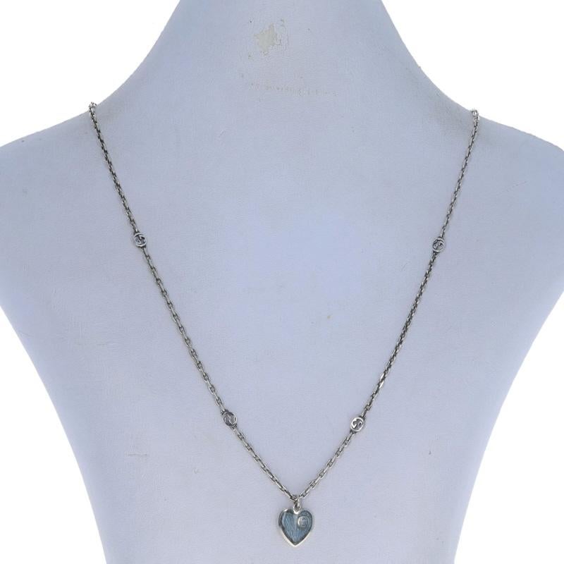 Retail Price: $440

Brand: Gucci
Design: Interlocking G

Metal Content: Sterling Silver

Material Information
Enamel
Color: Light Blue

Chain Style: Diamond Cut Cable
Necklace Style: Chain Station
Fastening Type: Lobster Claw Clasp
Theme: Heart,