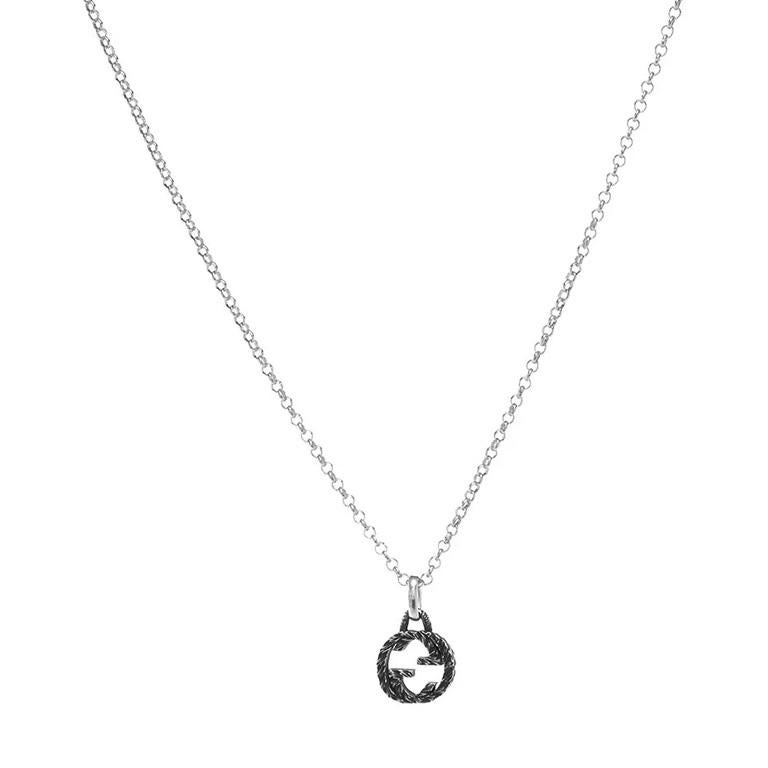 Gucci Ladies GG Sterling Silver Necklace. Crafted from sterling silver, This necklace has a burnished antique effect that makes it look as though it's been passed down for generations it also features a logo pendant and lobster claw fastening. Made