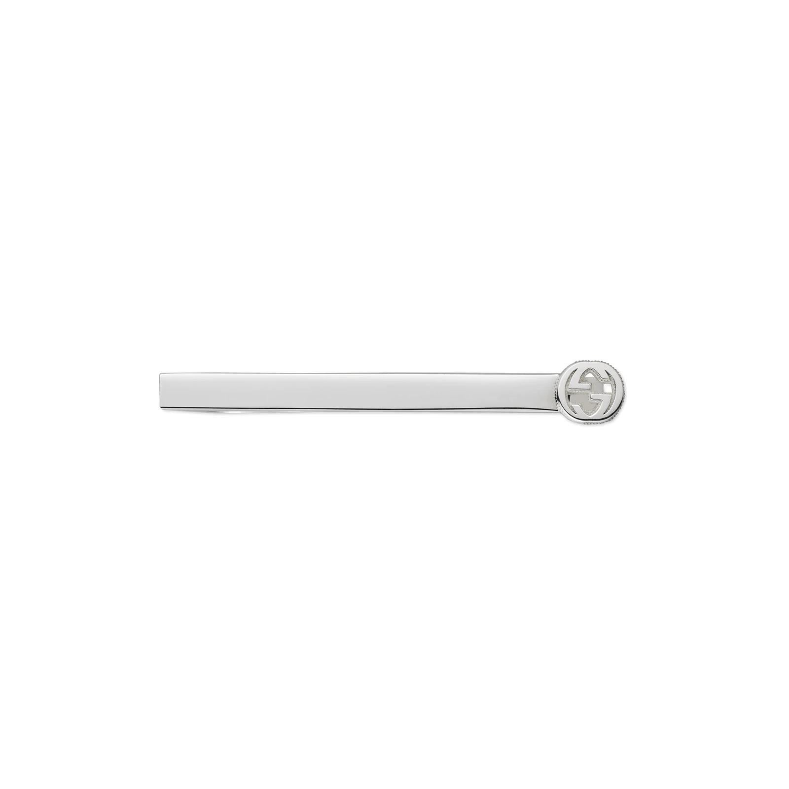 This sterling silver tie slide is the perfect companion to your favorite tie. Sleek and stylish with a textured signature GG logo print.

Sterling Silver
Silver Tie Slide
Signature GG logo