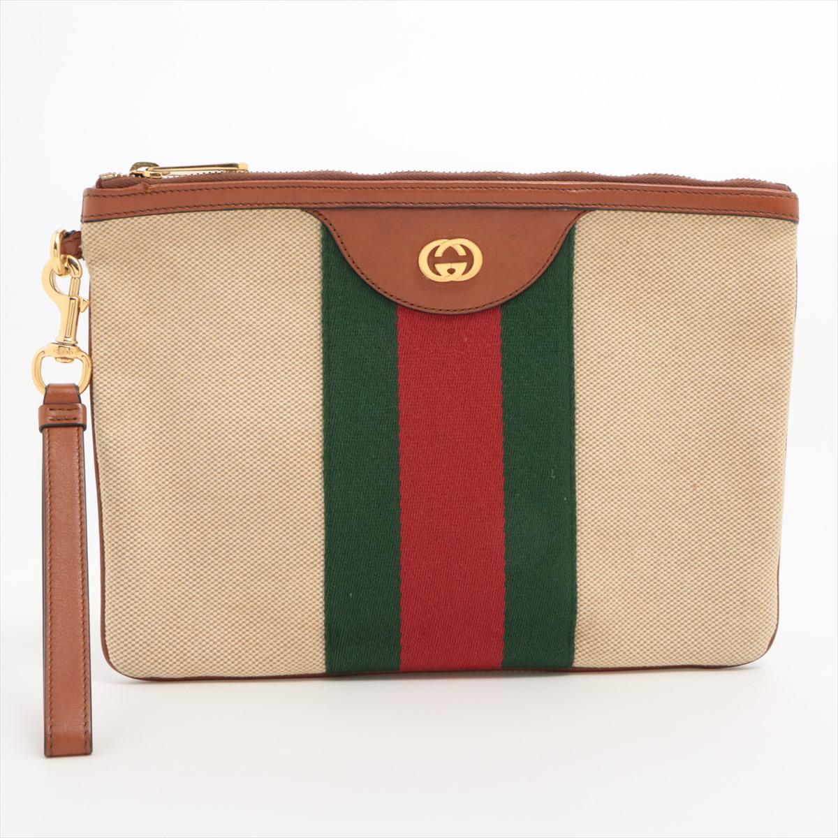 *ships around 11/11

The Gucci Interlocking G Web Canvas Pouch in beige is a stylish and practical accessory that embodies the brand's signature aesthetic. Crafted from durable canvas, the pouch features the iconic interlocking G logo prominently