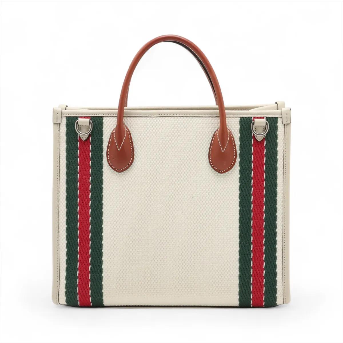 Bianco Gucci Logo GG a incastro in tela e pelle a due vie Borsa Tote Avorio x Marrone in vendita