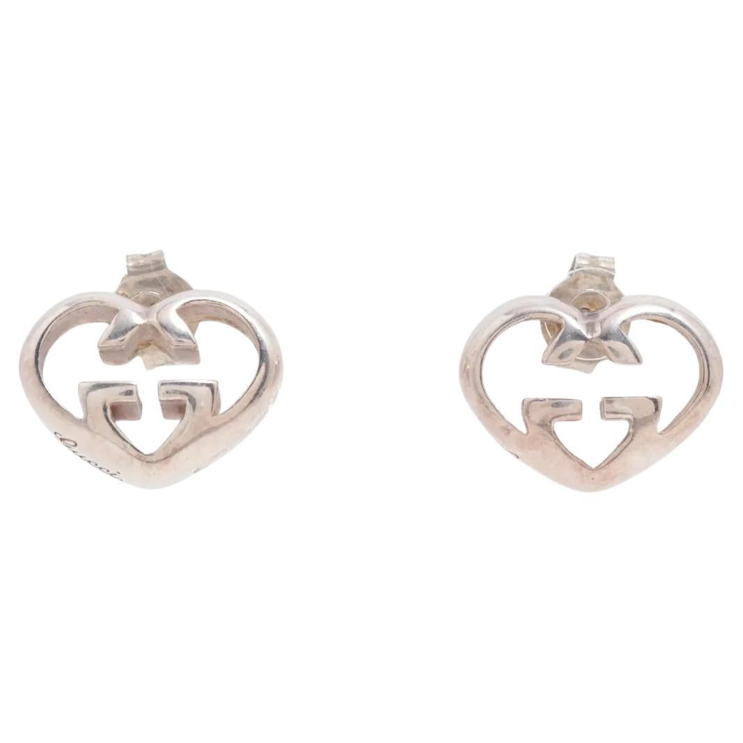 Pendiente de corazón con logotipo GG entrelazado de Gucci en venta