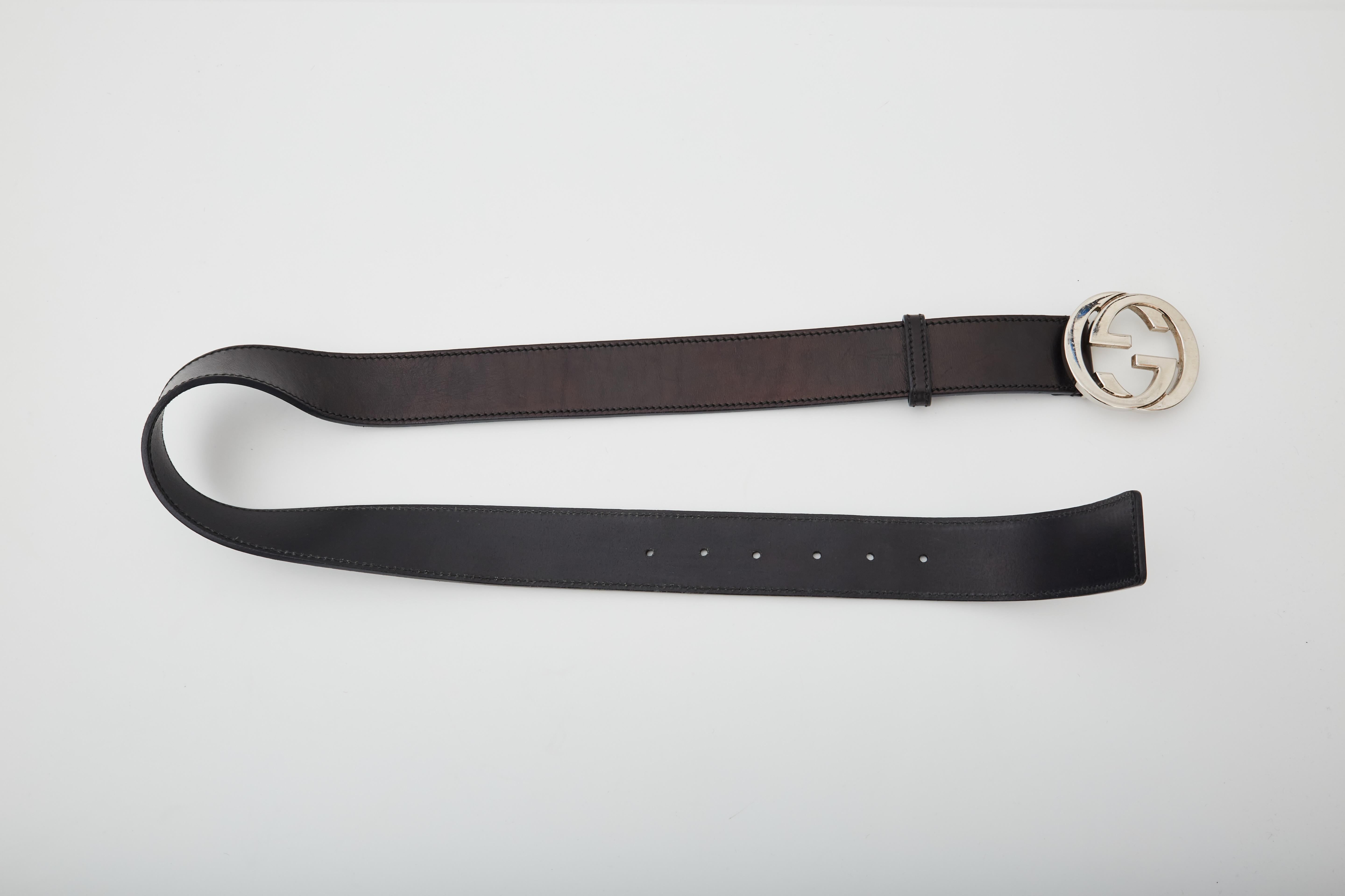 This stylish belt is crafted of fine black leather. The belt features an interlocking silver GG belt buckle.

COLOR: Black
MATERIAL: Leather
ITEM CODE: 114984 497717
MEASURES: L 39” x W 1.6” SIZE: 90 cm / 36 inch
CONDITION: Very good - light