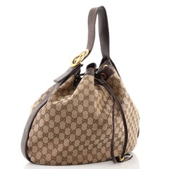 Gucci - Sac Hobo à cordon coulissant imbriqué « Icon » en toile GG - Large