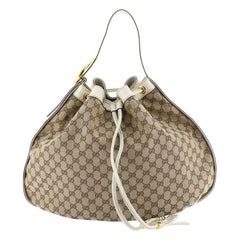 Gucci Interlocking Icon Drawstring Hobo GG Canvas Large