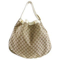 Gucci Interlocking Icon GG Ivory Monogram Canvas Large Drawstring Hobo Bag