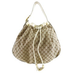Gucci Interlocking Icon GG Ivory Monogram Canvas Large Drawstring Hobo Bag