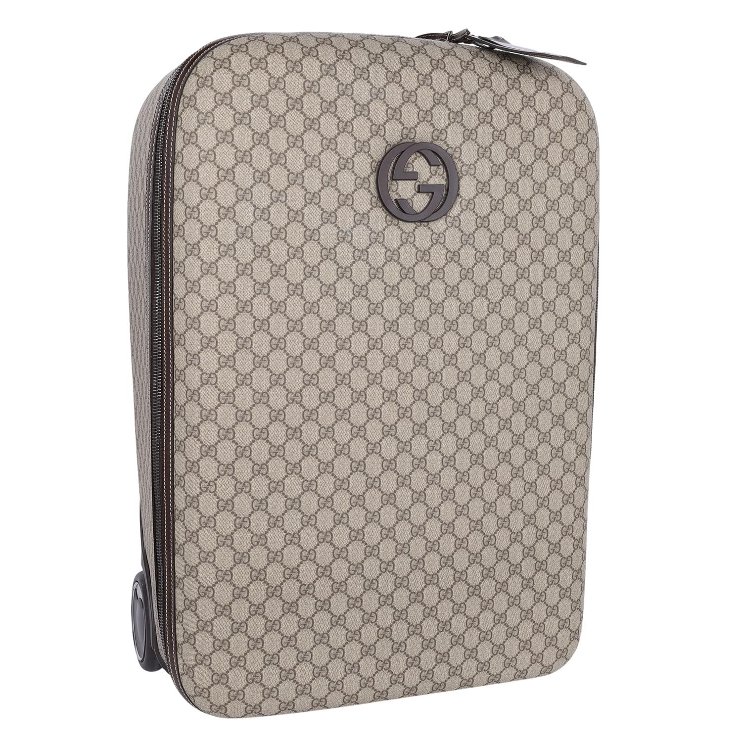 Authentic, pre-owned Gucci Interlocking Trolley GG coated canvas brown rolling luggage. This luxurious suitcase from the renowned Italian label Gucci guarantees you style anywhere, anytime, even when travelling. With its iconic signature GG canvas