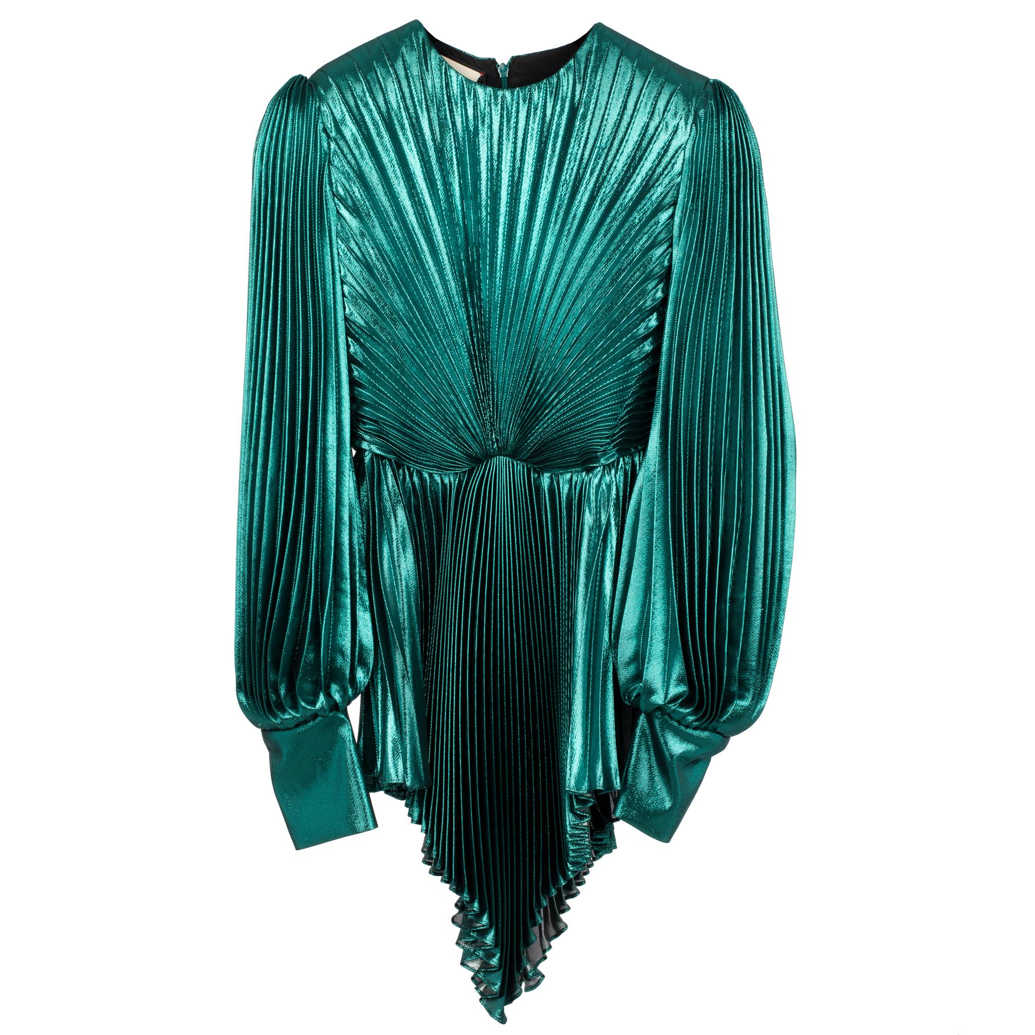 Brand:

Gucci

Product:

Pleated Silk Blend Mini Dress 

Size:

38 It

Colour:

Emerald Green

Material

Silk 65% & Polyester 35%

Condition:

Pristine; New Or Never Worn

Details

- Round Neckline

- Long Balloon Sleeves

- Concealed Back Zip